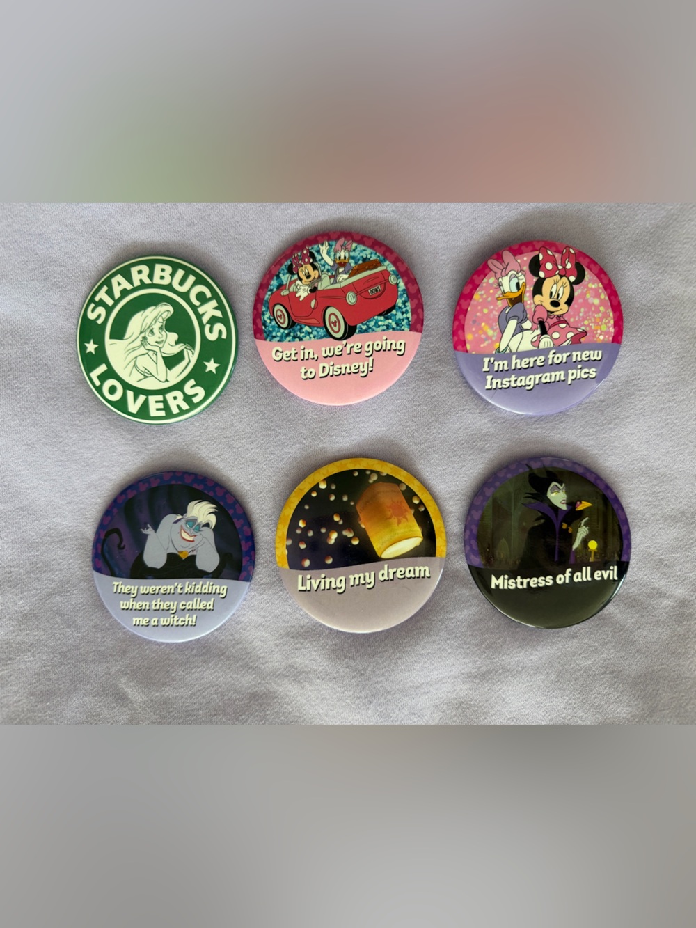 6 pin set of Disney buttons perfect for a day at the parks from small shop
